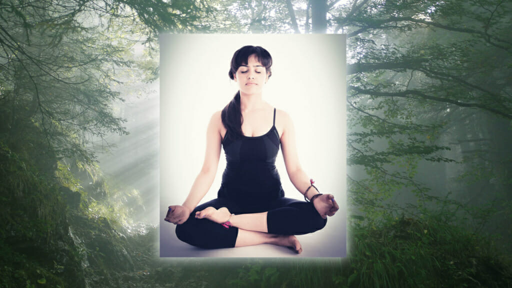 Frau beim Meditieren - Wirkung von Meditation