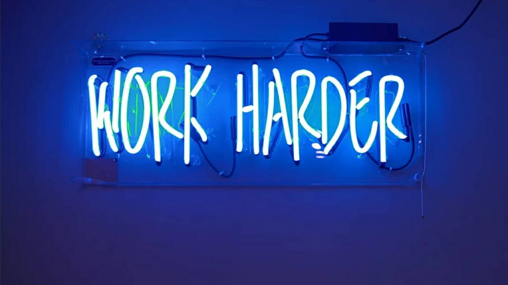 Neon Schriftzug "Work harder"